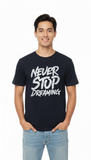 Loony Looms "Never Stop Dreaming" Bold Typography Tee β Black (100% Bio-Washed Cotton)